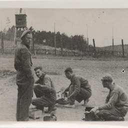 Prisoners of War cooking food.