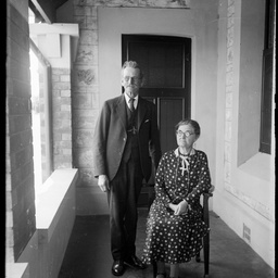 Couple on a verandah.