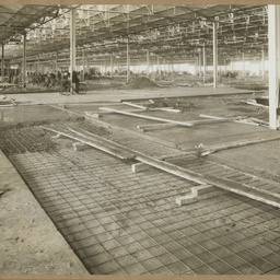 Laying concrete floor in Main Assembly Plant.