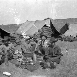 Soldiers eating.