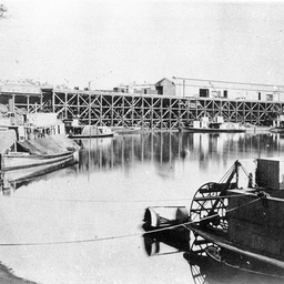 Shipping at Echuca Wharf with a sternwheeler in foreground