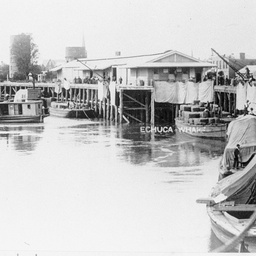 Shipping at Echuca Wharf with large weatherproof coverings drying