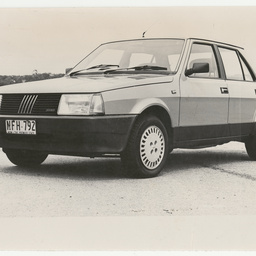 Photographs relating to Messenger Press : cars
