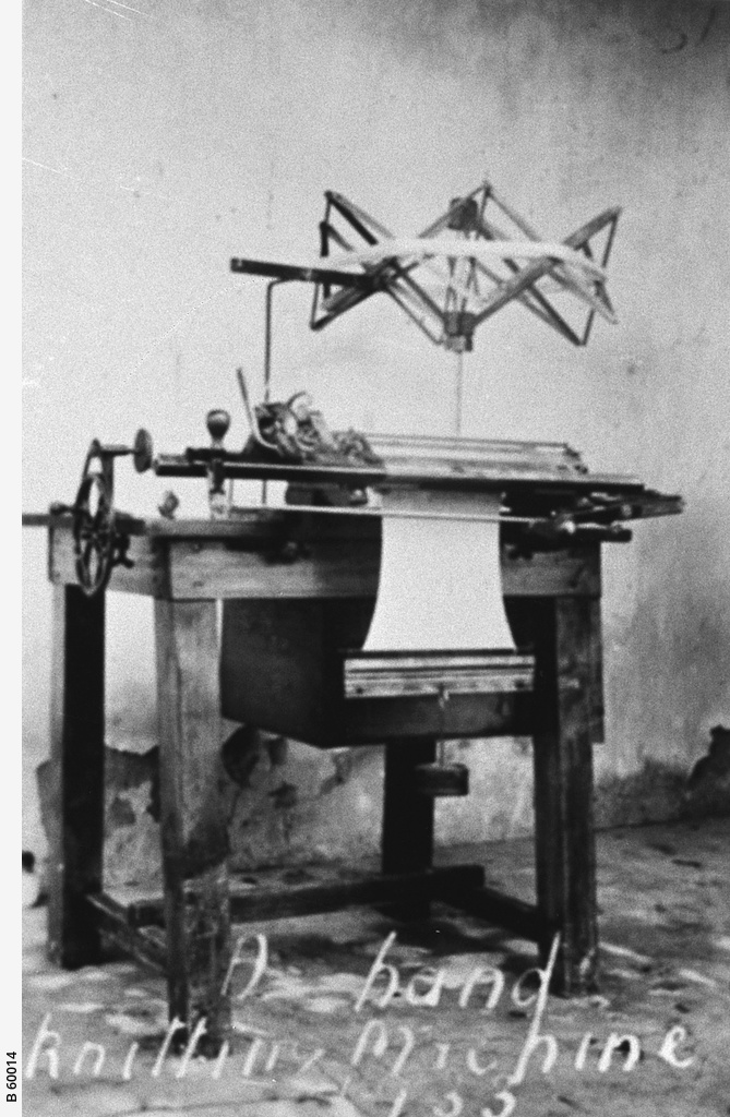 Early make knitting machine • Photograph • State Library of South Australia