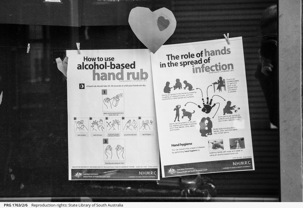 Hand rub notices hanging at Pedare Christian College • Photograph