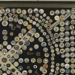 Framed collection of World War I badges