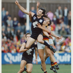 Photographs relating to football, including Adelaide Crows