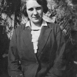 Woman sitting in a garden