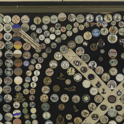 Framed collection of World War I badges