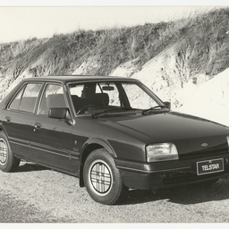 Photographs relating to Messenger Press : cars