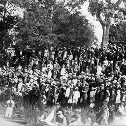 Spectators at a swimming event in the Torrens River, Adelaide