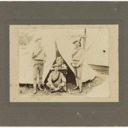 Soldiers in front of a tent
