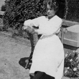 Woman sitting in a garden