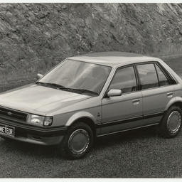 Photographs relating to Messenger Press : cars