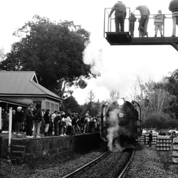 Train arriving at a railway station.