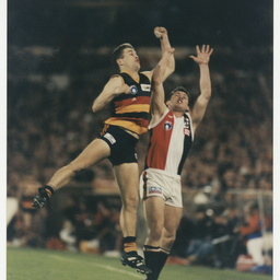 Photographs relating to football, including Adelaide Crows