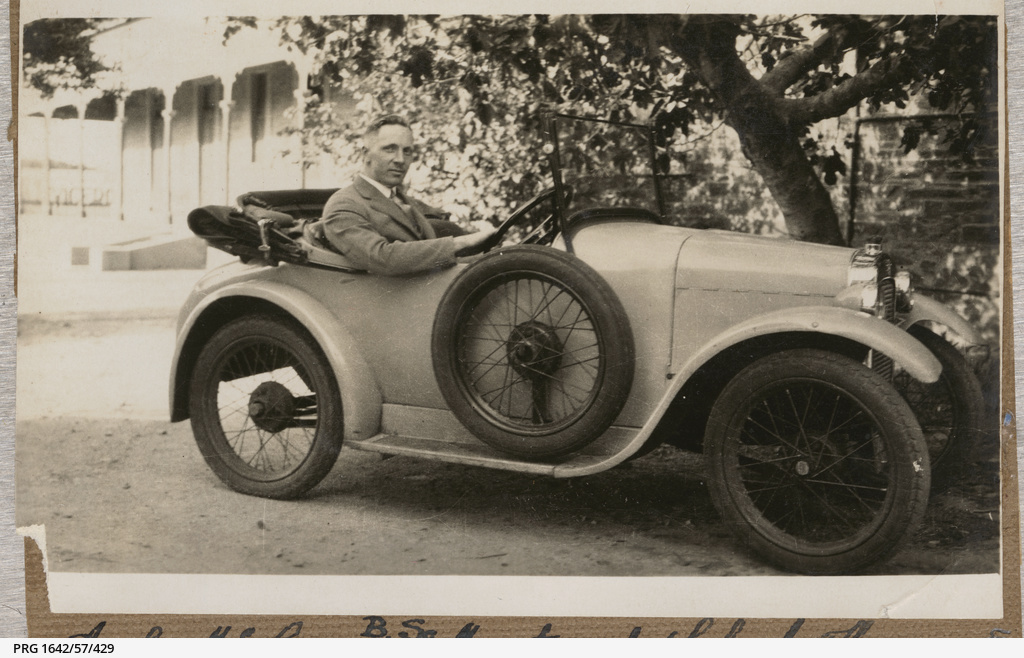 A.E. McLean in a car • Photograph • State Library of South Australia