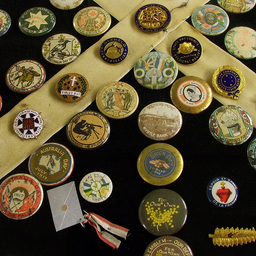 Framed collection of World War I badges
