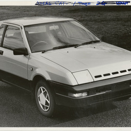 Photographs relating to Messenger Press : cars