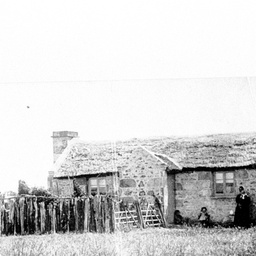 The Needles, showing a cottage and family group
