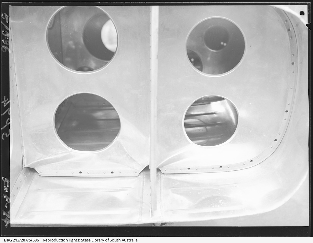 Damaged Beaufort petrol tank • Photograph • State Library of South