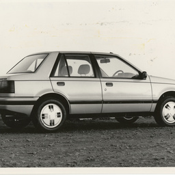 Photographs relating to Messenger Press : cars