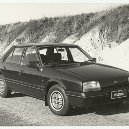 Photographs relating to Messenger Press : cars