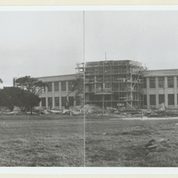 East wall of Parts Department and Office Building.