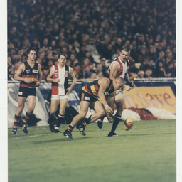 Photographs relating to football, including Adelaide Crows