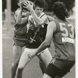 Photographs relating to football, including Adelaide Crows