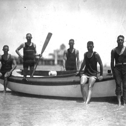 Men with a rowing boat at Henley Beach, South Australia