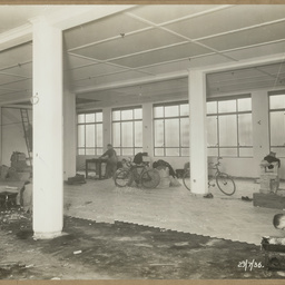 Laying parquetry in showroom.