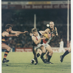 Photographs relating to football, including Adelaide Crows