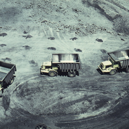Trucks waiting to be loaded.