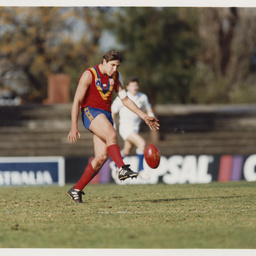 Photographs relating to football, including Adelaide Crows