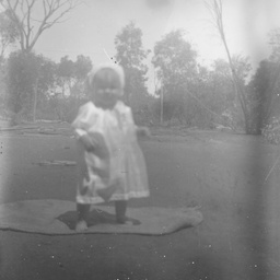 Toddler in a garden