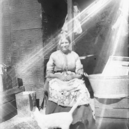 Woman beside a tub