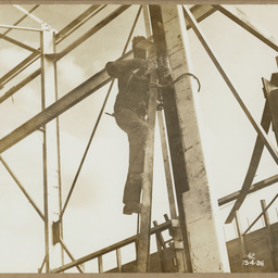 Welding door guides, Main Crane Bay.