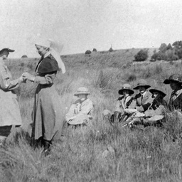 Girl Guides watching a first aid demonstration