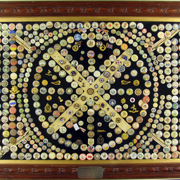 Framed collection of World War I badges