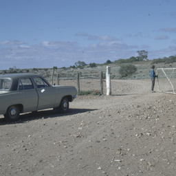 Opening a gate.