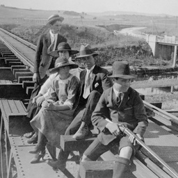 People on railway bridge