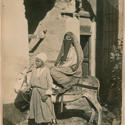 A woman on a donkey