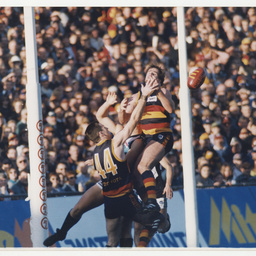 Photographs relating to football, including Adelaide Crows