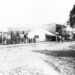 Early view of Berri buildings with dirt road
