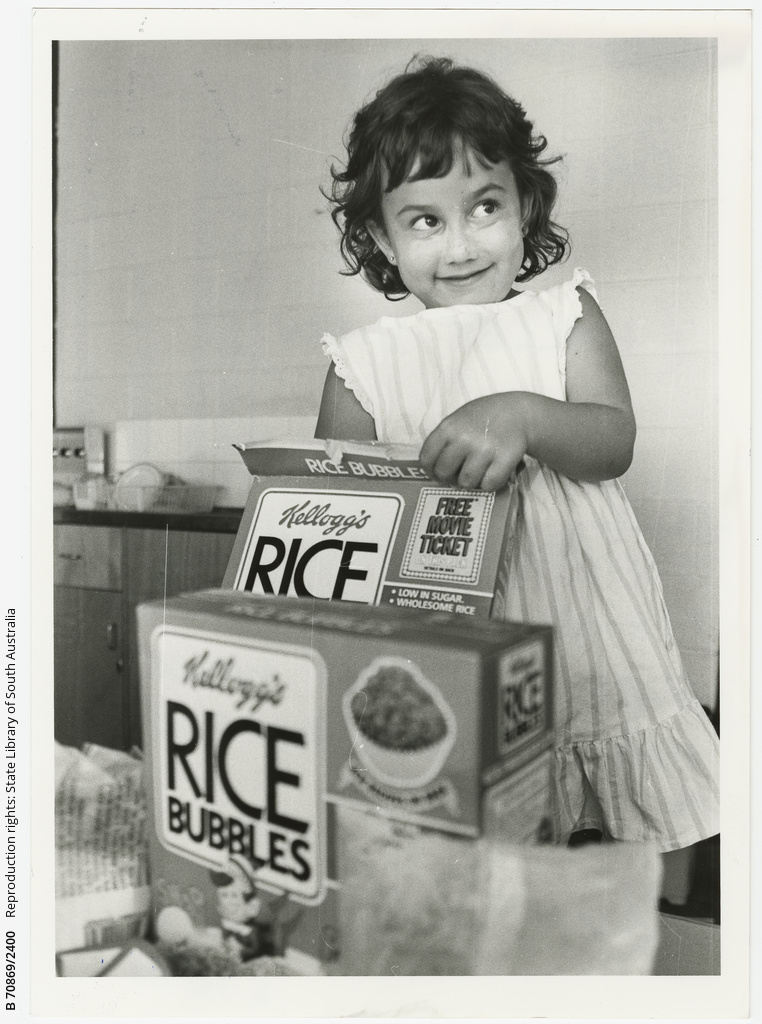 Fouryearold Bridgette, of Valley View, grabbed a handful of Rice