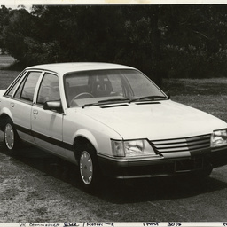 Photographs relating to Messenger Press : cars