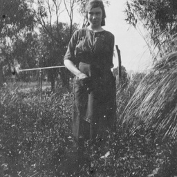 Woman standing in a garden