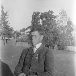 Young man in a garden