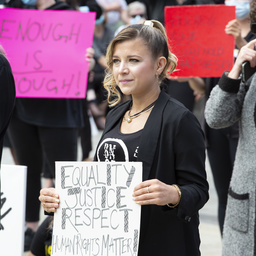 Woman holding a sign at the Adelaide Women's March 4 Justice protest, Tarntanyangga / Victoria Square